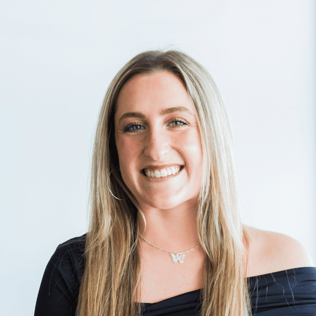 Portrait of Cierra, a professional stylist at Escape Blowdry Bar and Salon, showcasing their expertise and style.