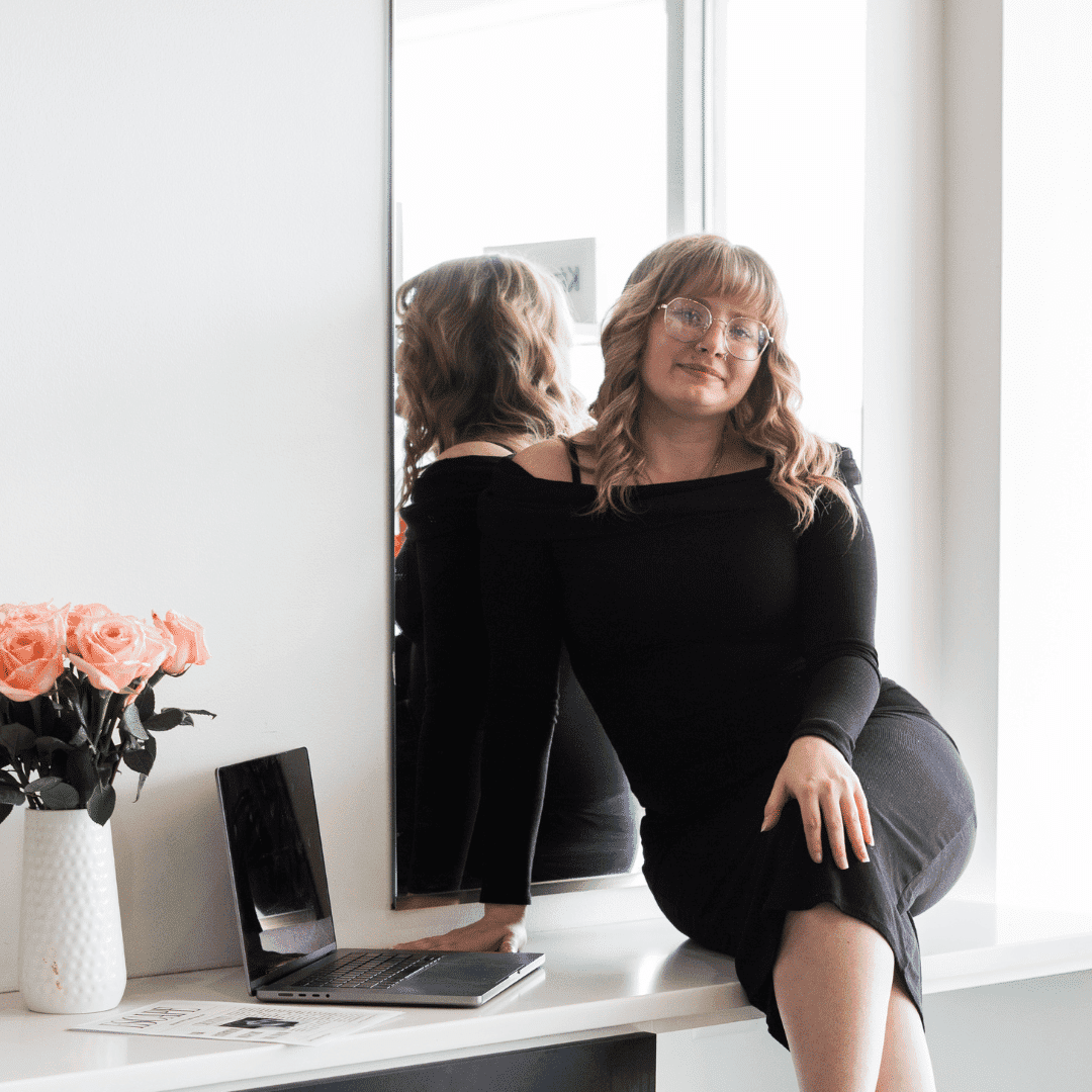 Portrait of Maria, a professional stylist at Escape Blowdry Bar and Salon, showcasing their expertise and style.
