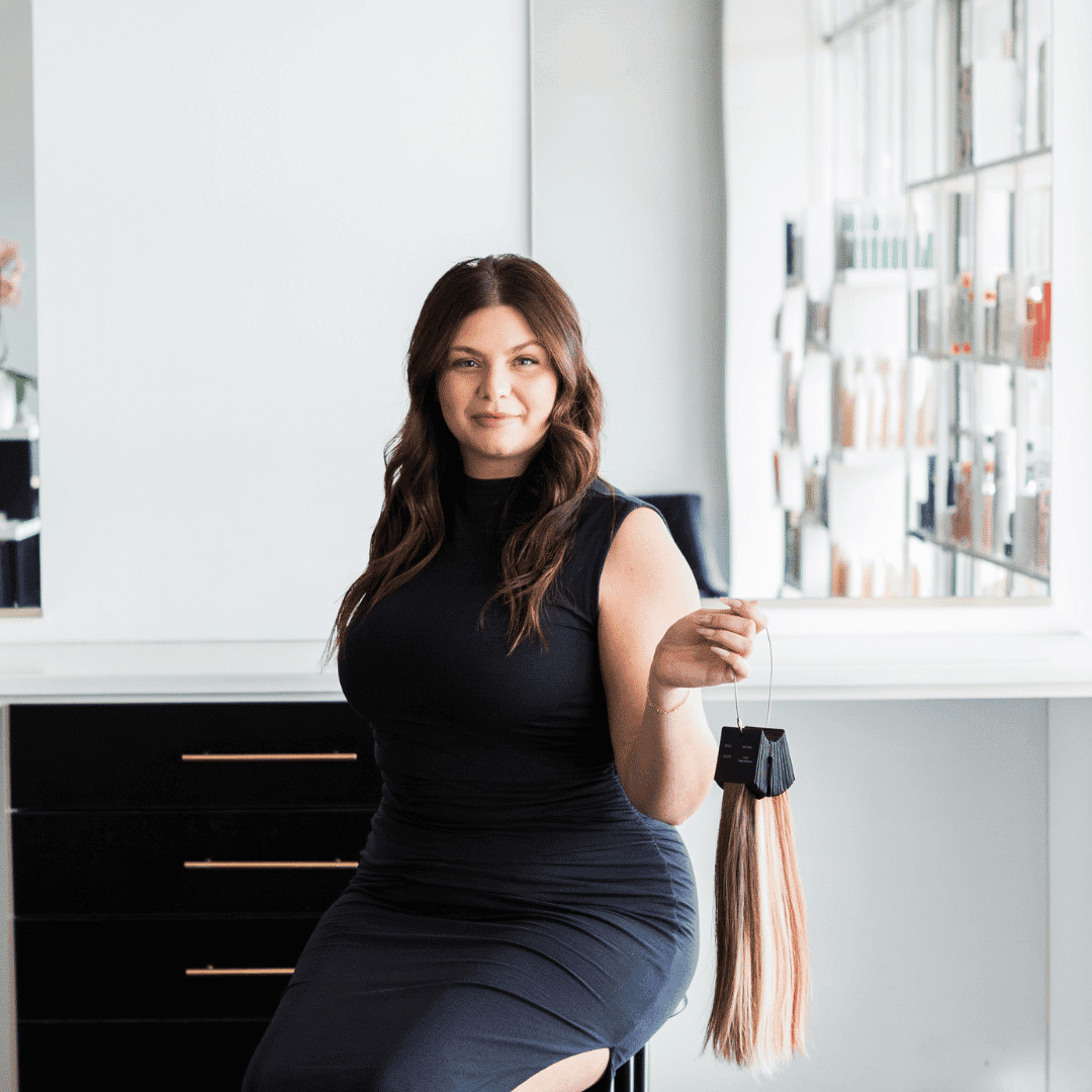 Portrait of Aspen, a professional stylist at Escape Blowdry Bar and Salon, showcasing their expertise and style.
